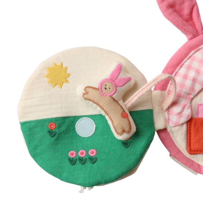 Livre d'éveil lapin rose - Chichi pompon