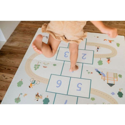 Tapis puzzle, boîte de rangement & mini maison - Marelle